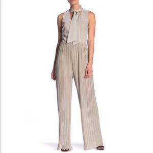 Adelyn Rae Jolene Tie-neck Pleated Jumpsuit NWOT